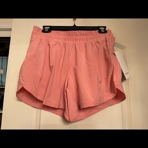 Light pink lululemon tracker shorts 5”